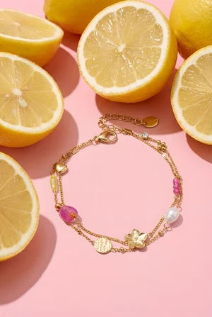 Bedelarmband met steentjes, kraaltjes en munt
