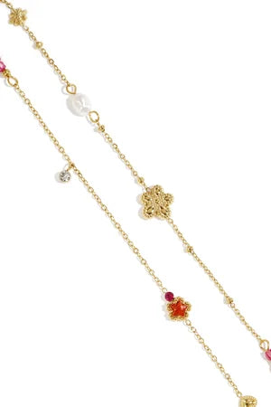 Bedelarmband met ster en bloemcharms, parels, steentjes