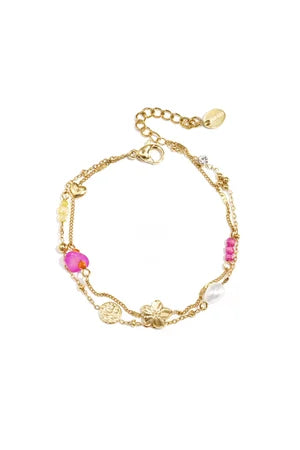 Bedelarmband met steentjes, kraaltjes en munt